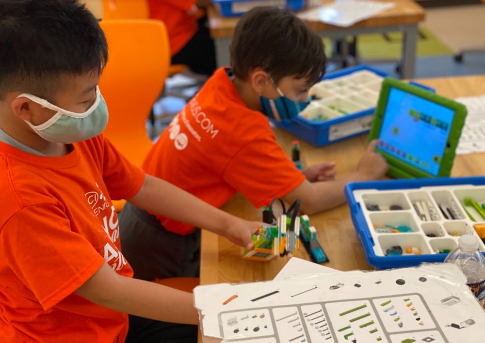 campers building and programming a robot