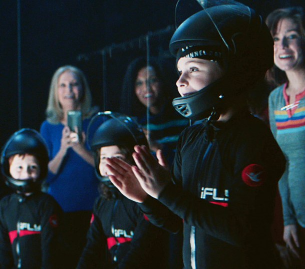 kid in iFly gear and helmet
