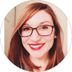 Google profile image of Amy Murphy; a smiling young woman with red hair and glasses.